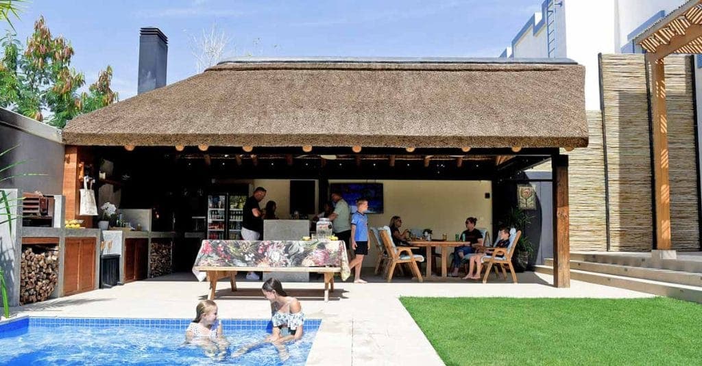Transform Your Backyard into a Tranquil Oasis with a Thatched Outdoor Living Room