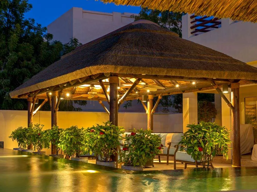 Experience the Charm of a Cape Reed Gabled Thatched Roof Gazebo in Dubai.