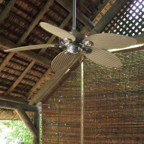 Hunter outdoor fans displayed on a patio, offering stylish and effective cooling solutions for outdoor spaces.