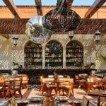 Engineered laminated timber pergola installed at Gitano in Dubai.